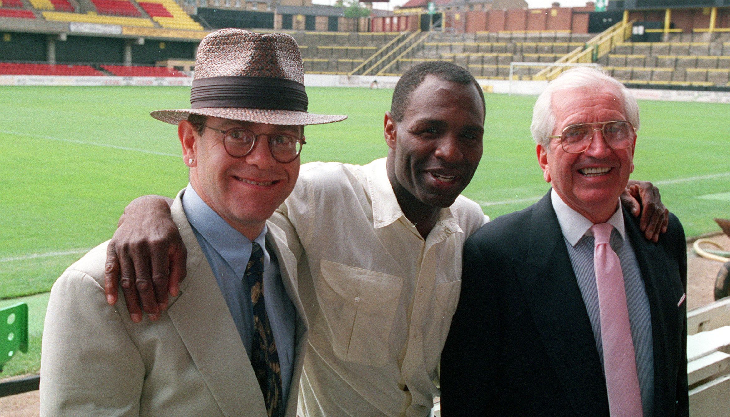 Luther Blissett after signing for Watford with Jack Petchie (RIGHT) and Elton John at Vicarage Road.