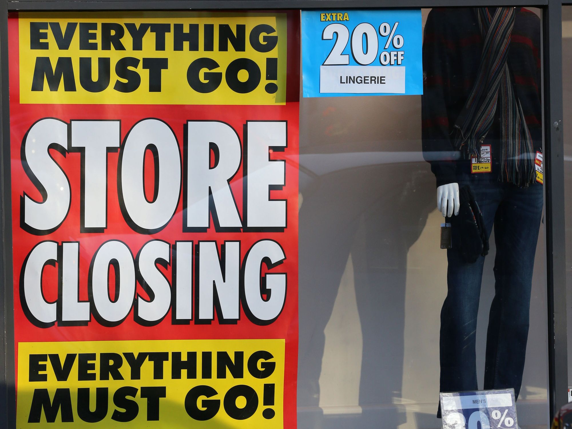 M&Co store closing sale sign in pictures