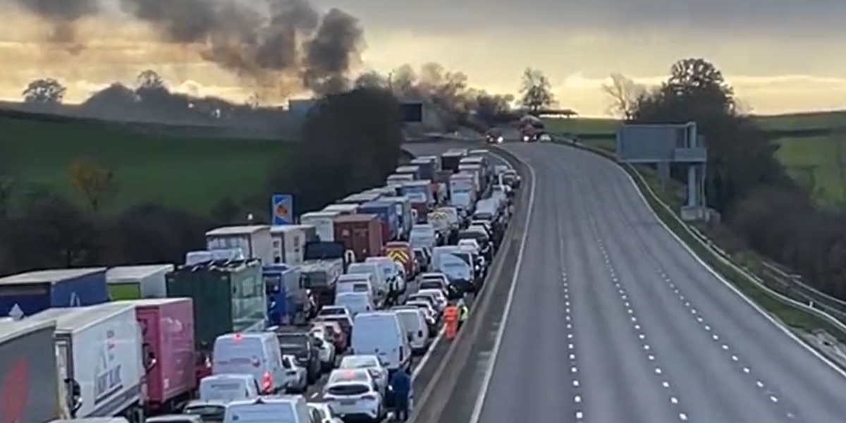 NextImg:Motorway closed in both directions after lorry engulfed by huge flames - hour long delays
