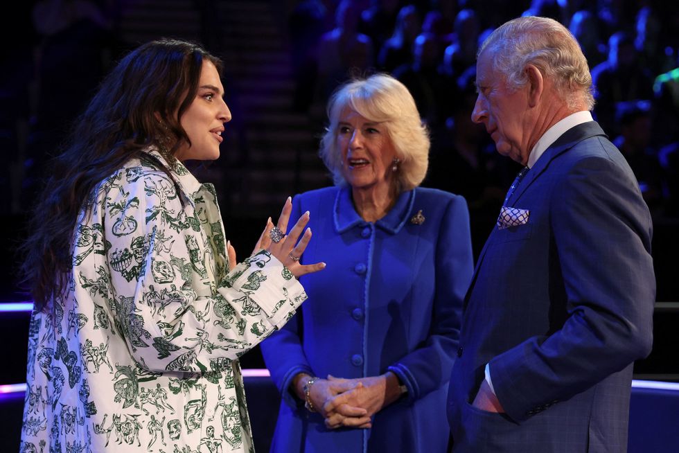 Mae Muller with Queen Camilla and King Charles