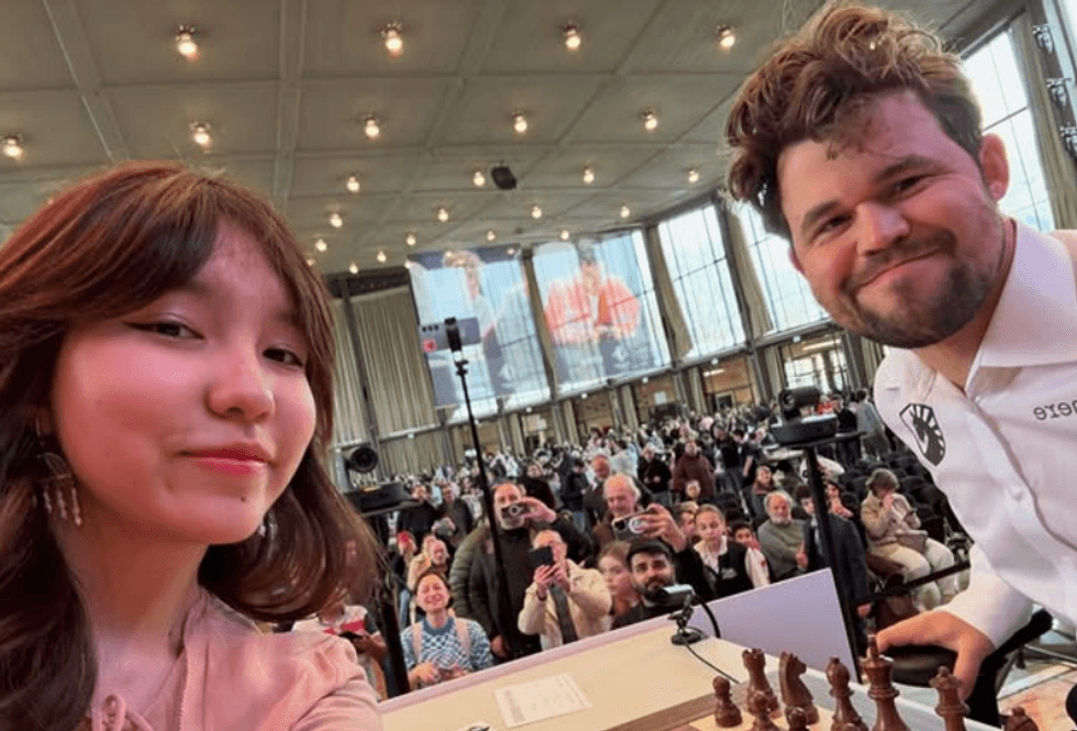 Magnus Carlsen and Alua Nurman