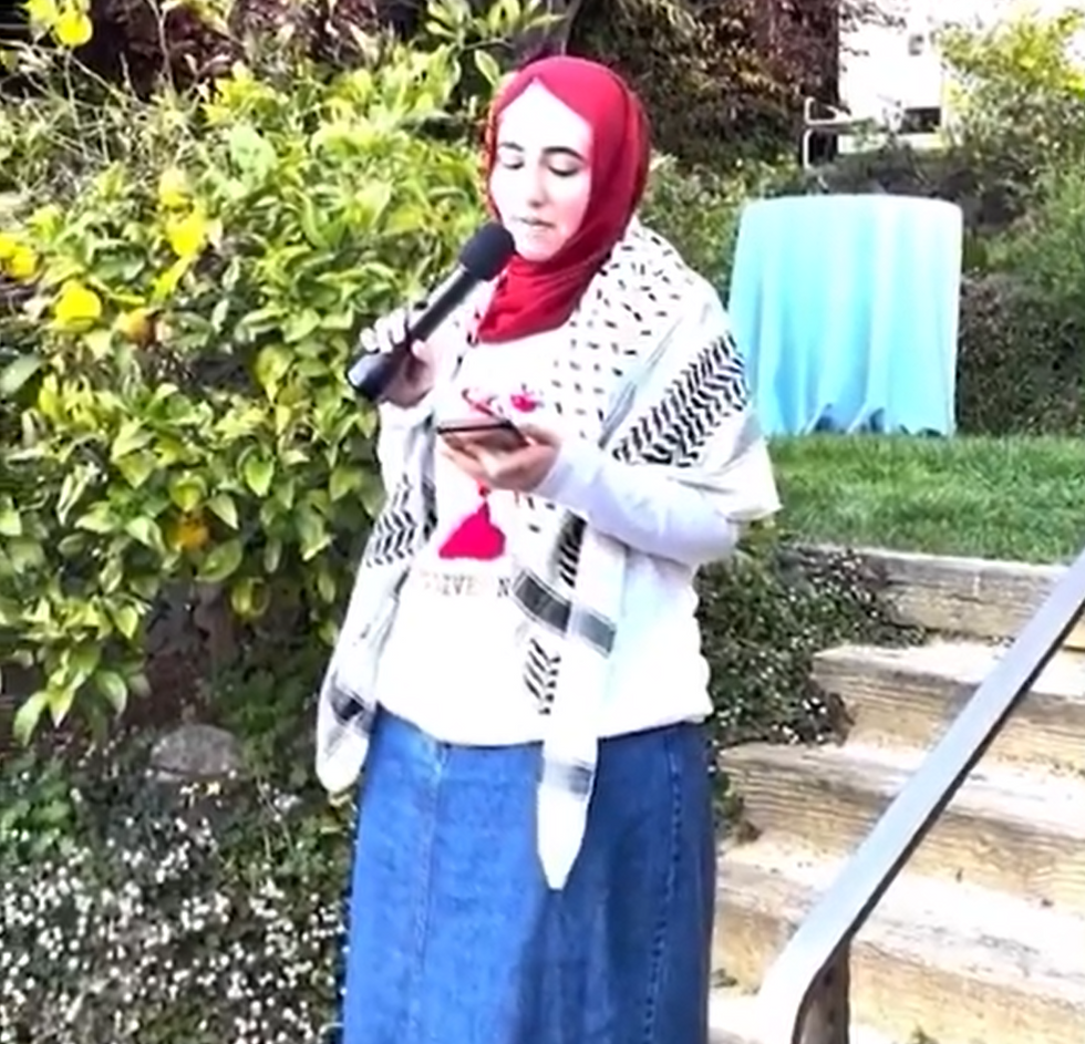 Malak Afaneh was speaking into the microphone on the steps of their home, near the Californian campus.