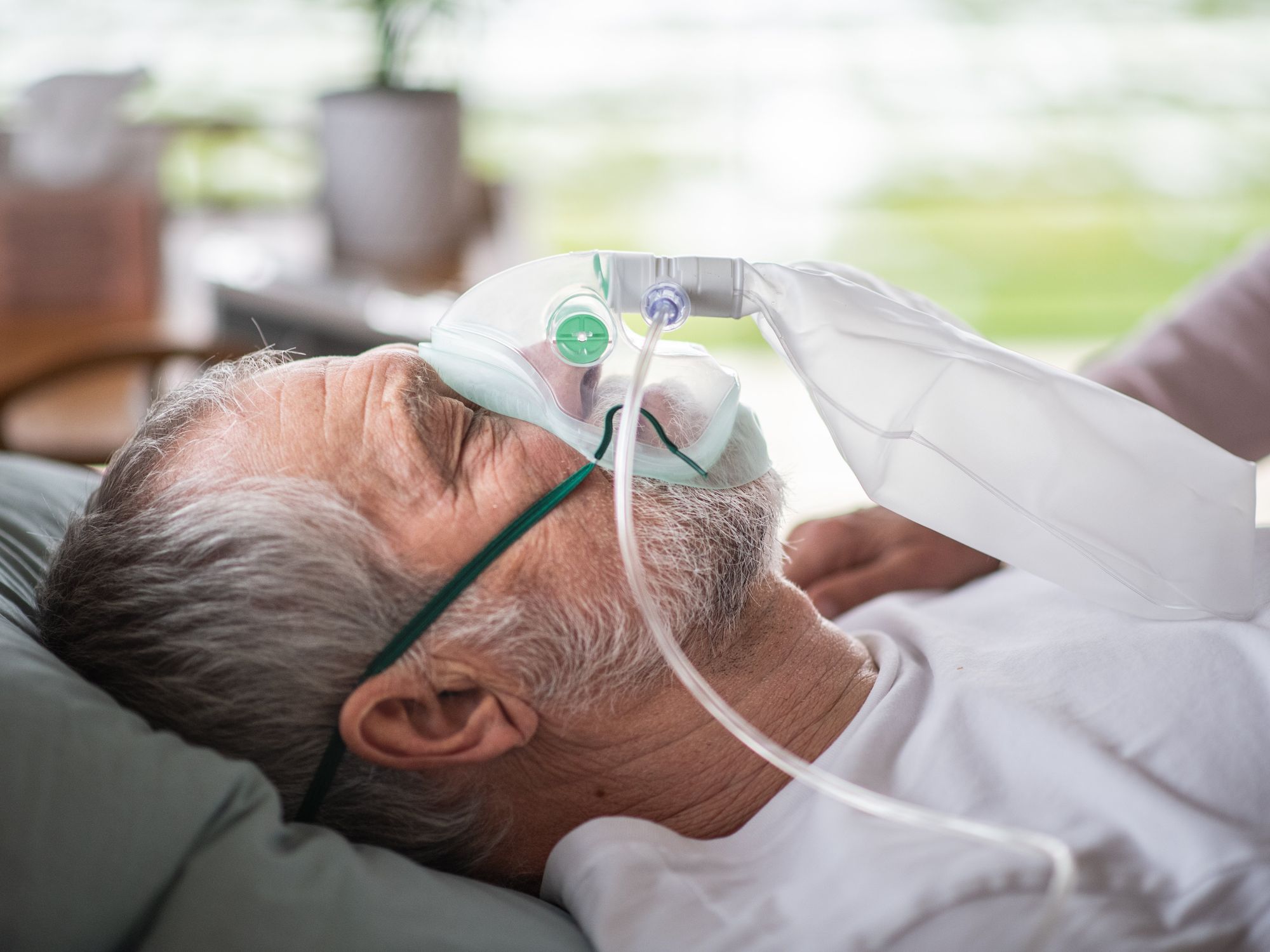 MALE RECEIVING OXYGEN