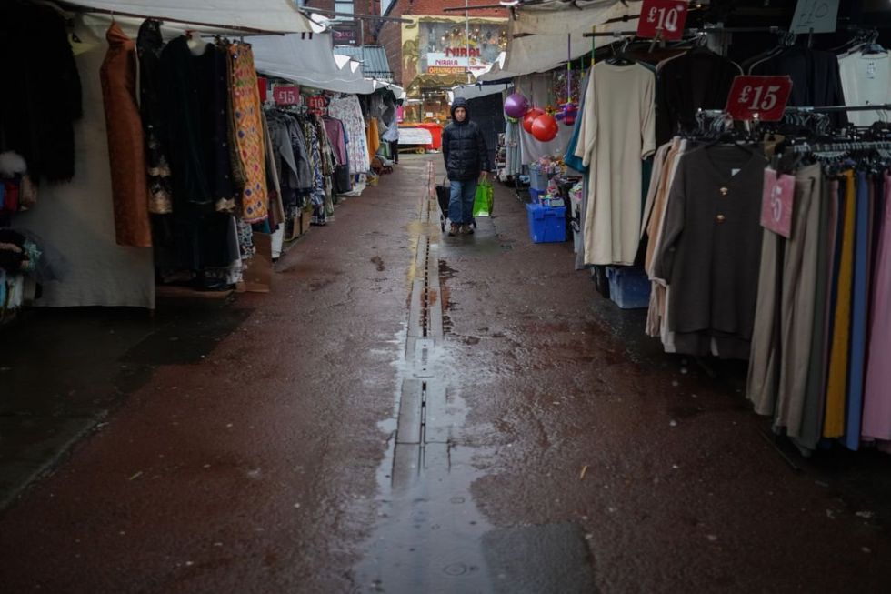 Malik worked at the Islamic bookstall in Longsight market in Manchester