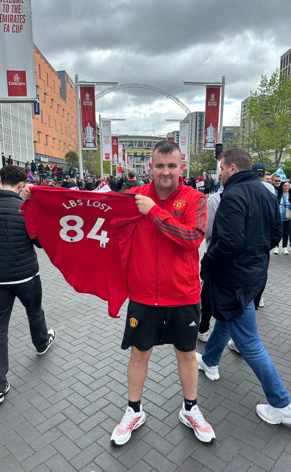 Man after weight loss football shirt