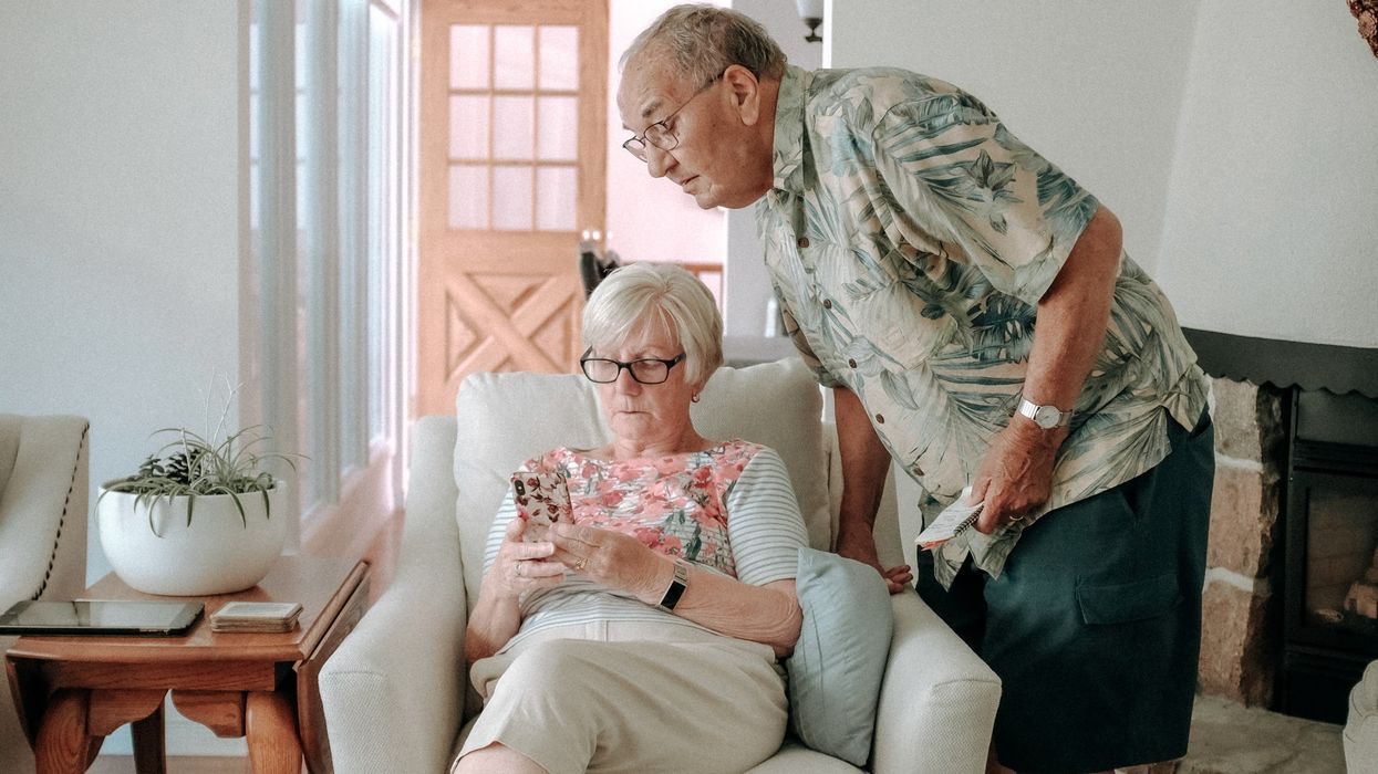 Man and woman checking a phone