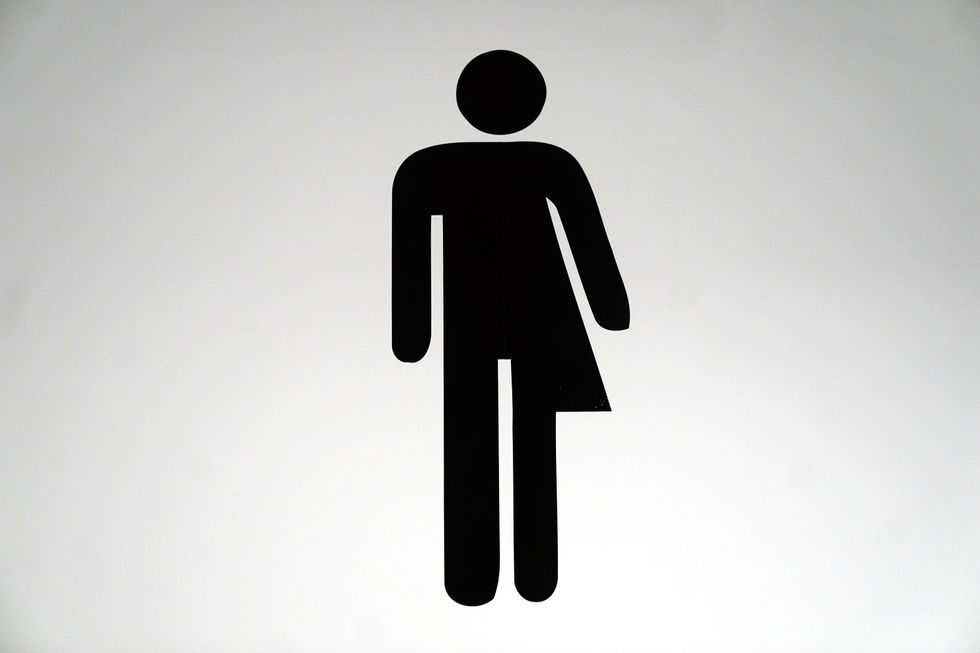 Man and woman toilet sign