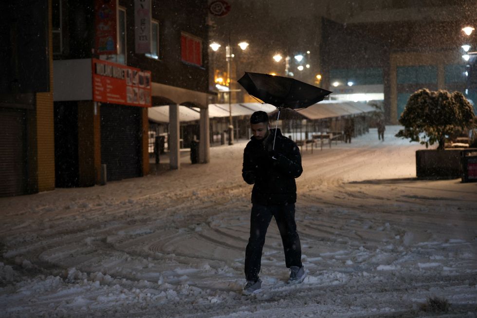 Man battles through windy conditions in Walsall