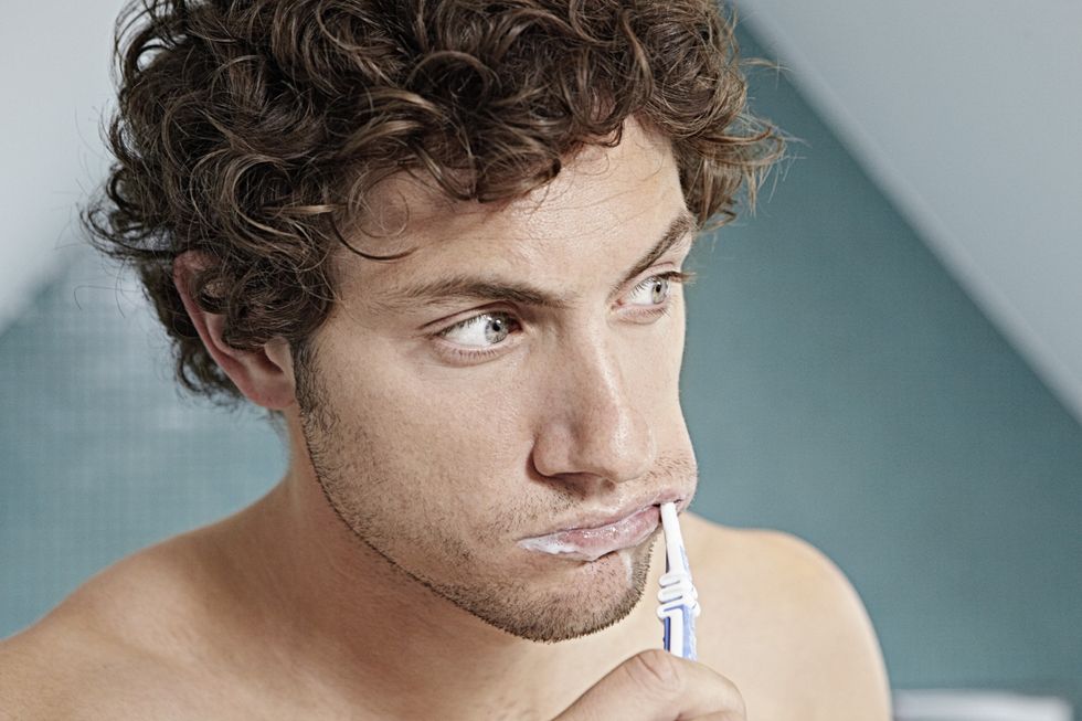 Man brushing his teeth