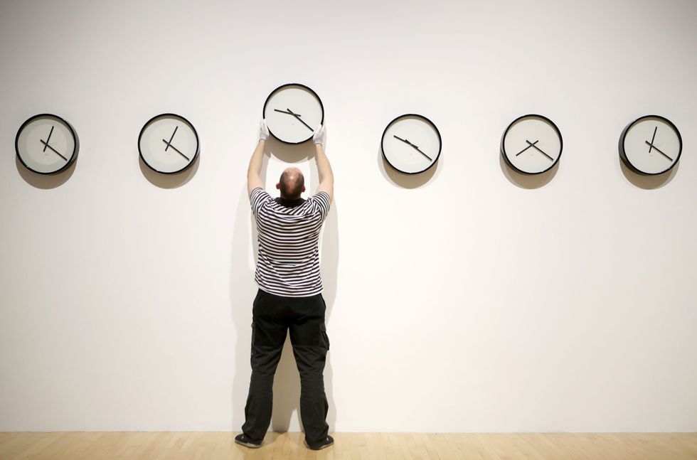 Man changes clock