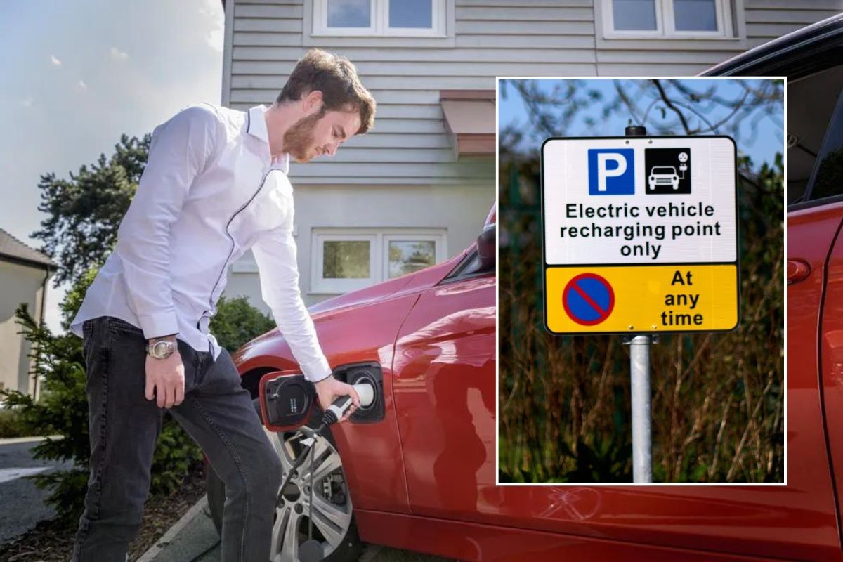 Man charging an electric car and an electric car charging sign