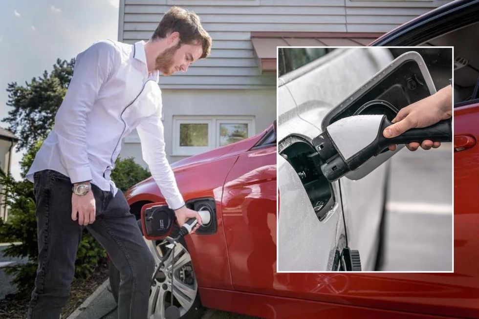 Man charging an electric car and an electric vehicle charger