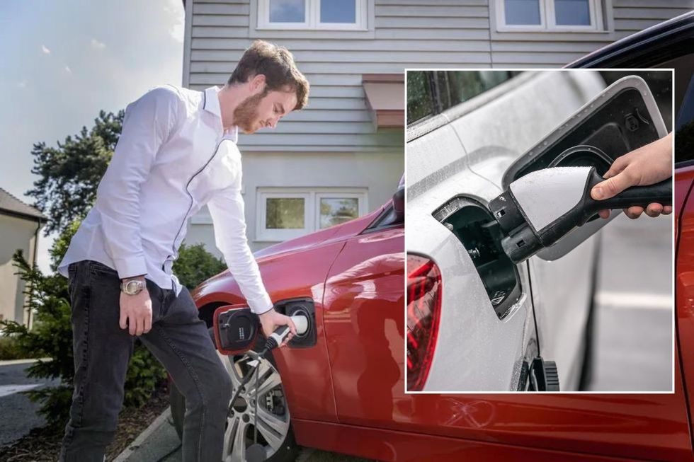 Man charging an electric car and an EV charger