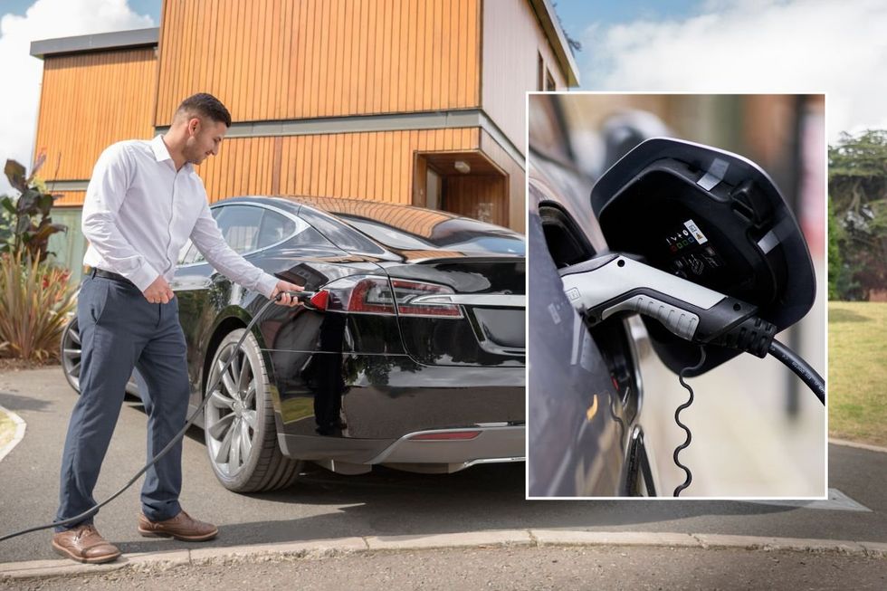 Man charging an electric car at home and an EV charger