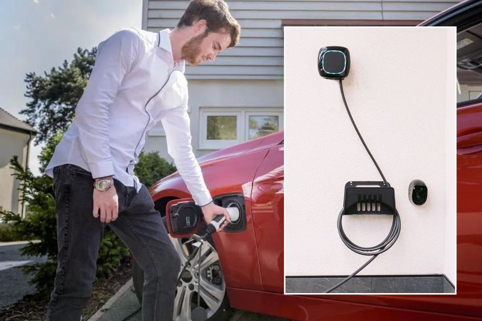 Man charging electric vehicle at home and a home EV charger
