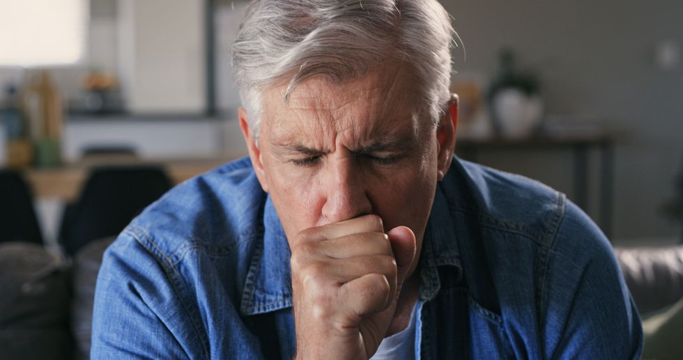 Man coughing