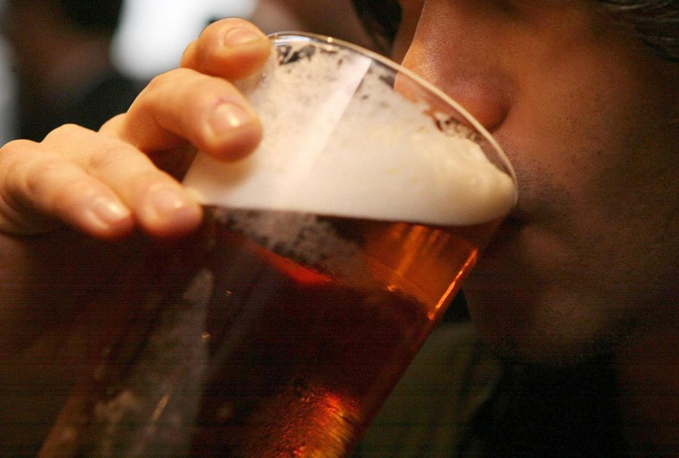 Man drinking a pint