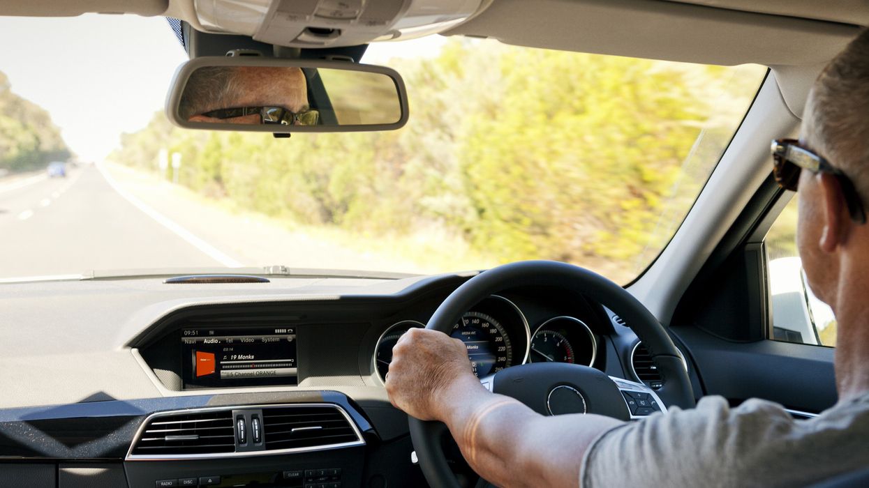 Man driving a car