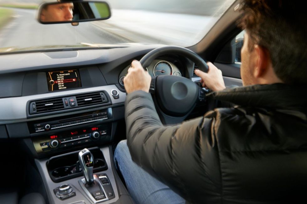 Man driving a car