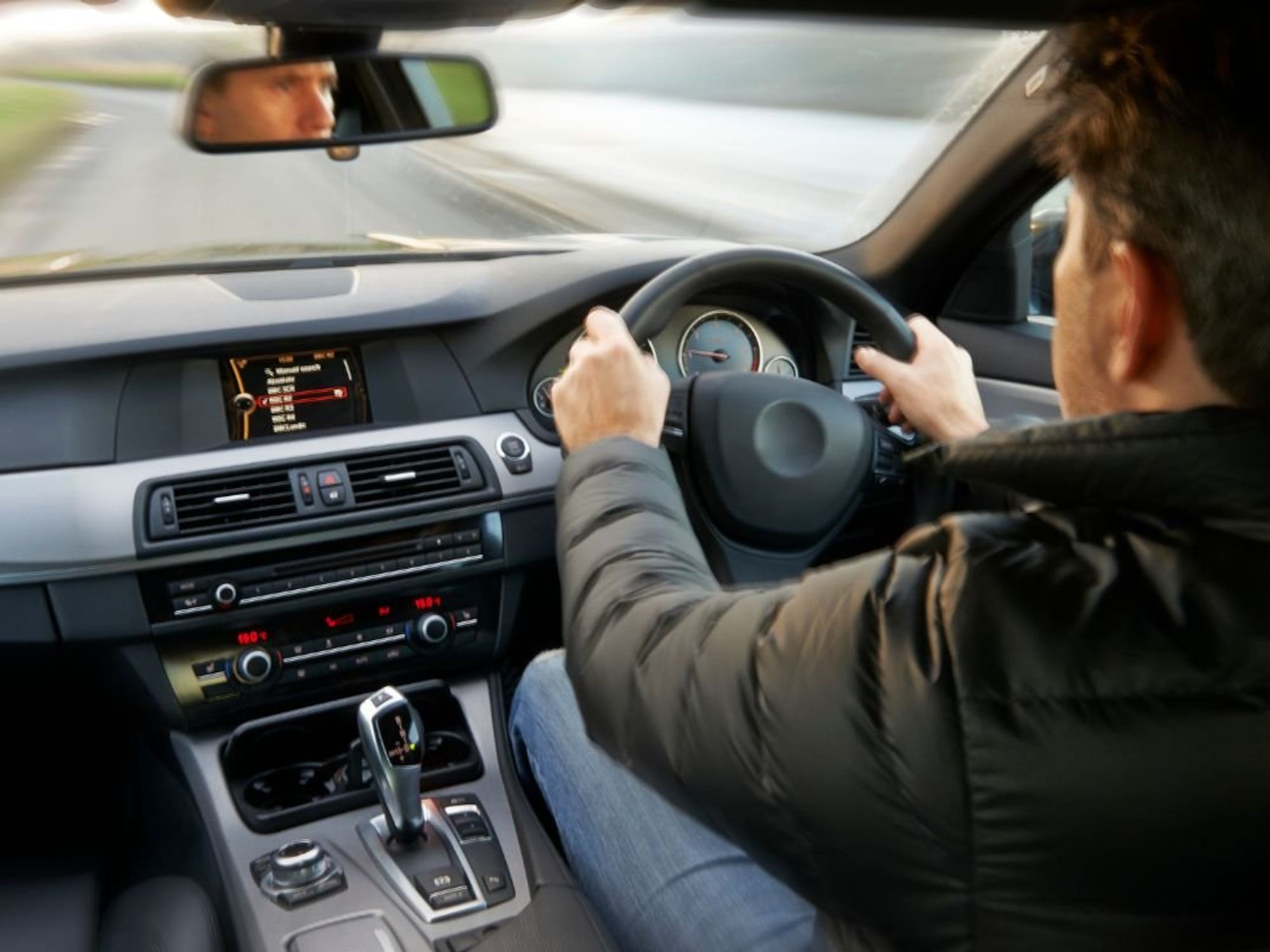 Man driving a car