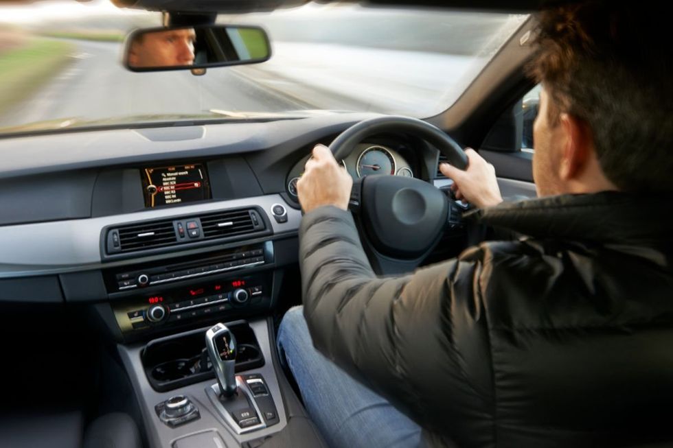 Man driving a car