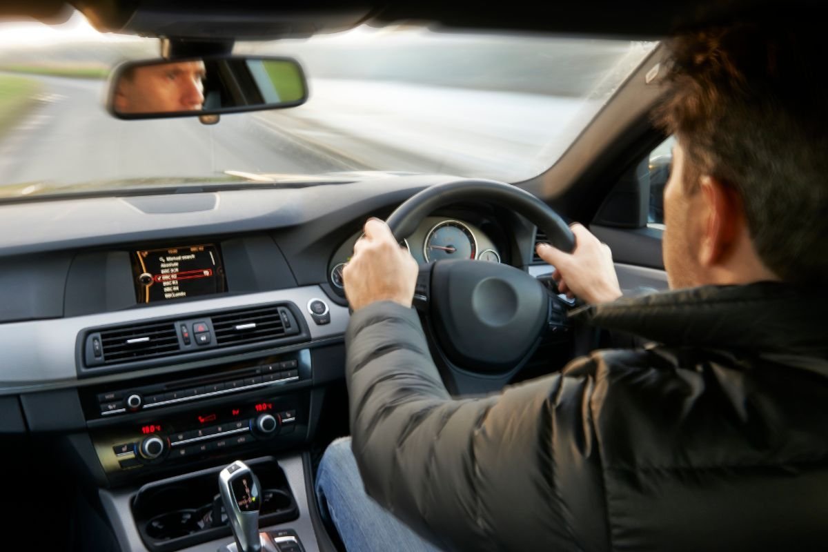 Man driving a car