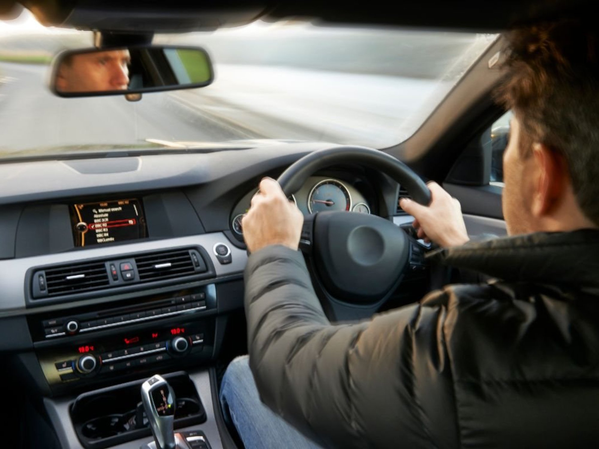 Man driving a car