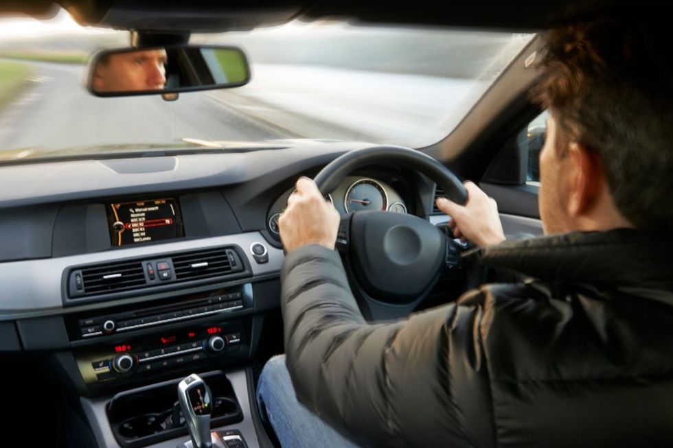 Man driving a car