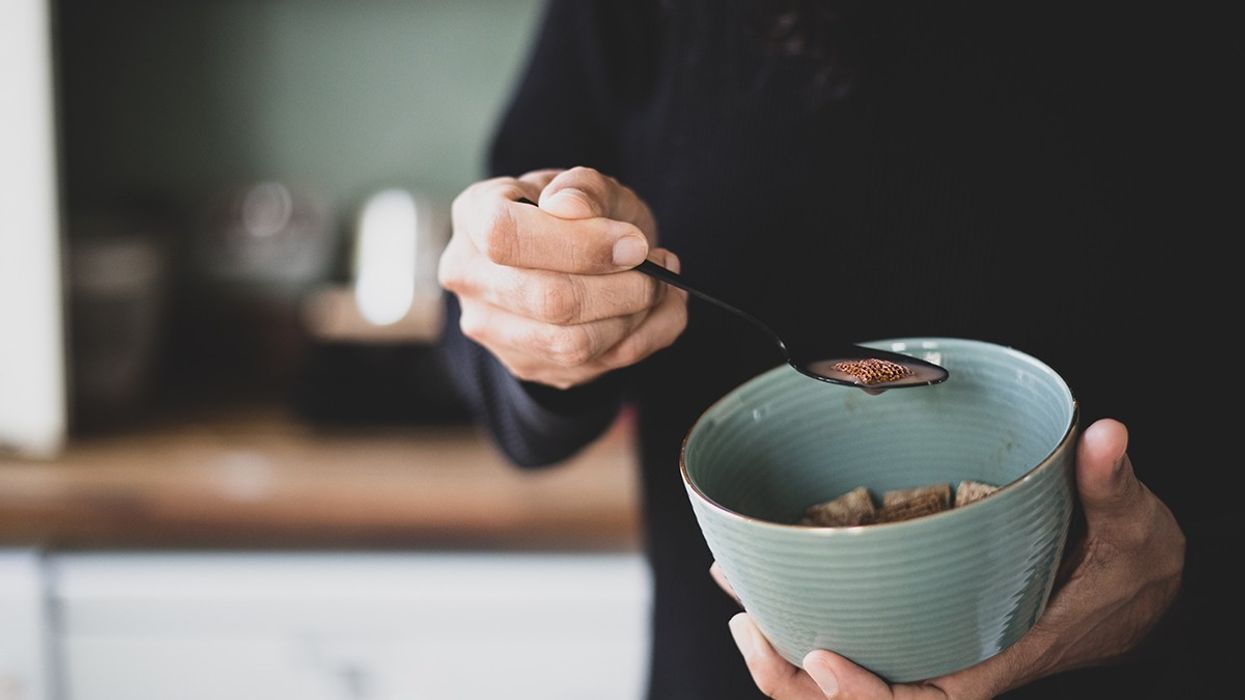 Man eating a bowl of cereal