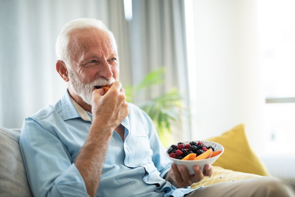 Man eating berries