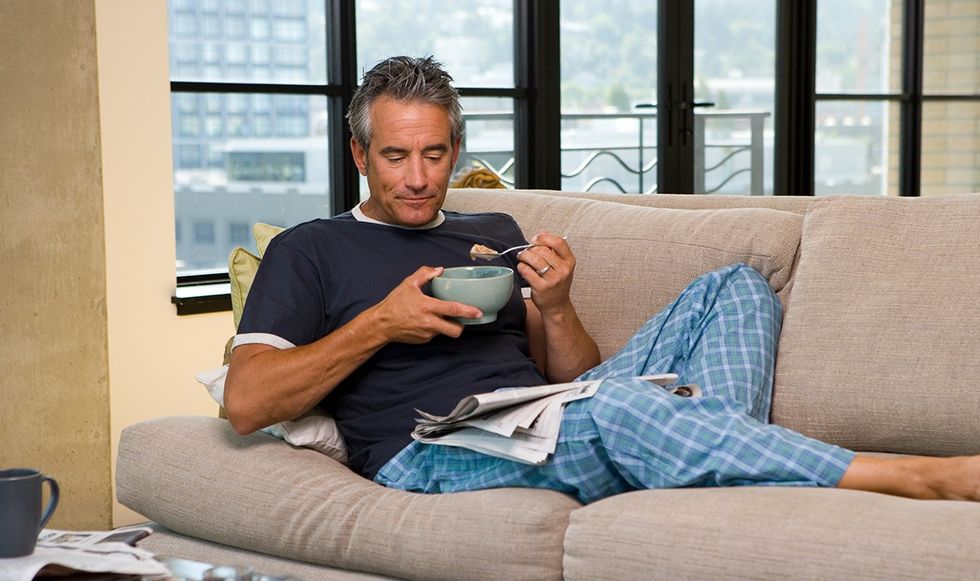 Man eating breakfast cereal