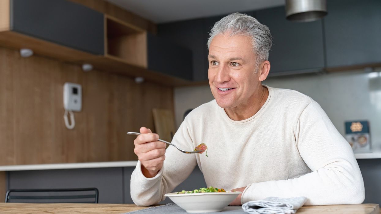 Man eating salad
