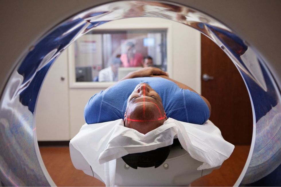 man entering MRI
