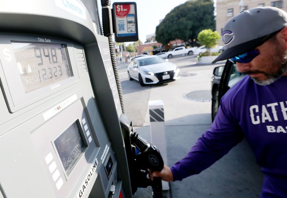 Man filling his car with fuel