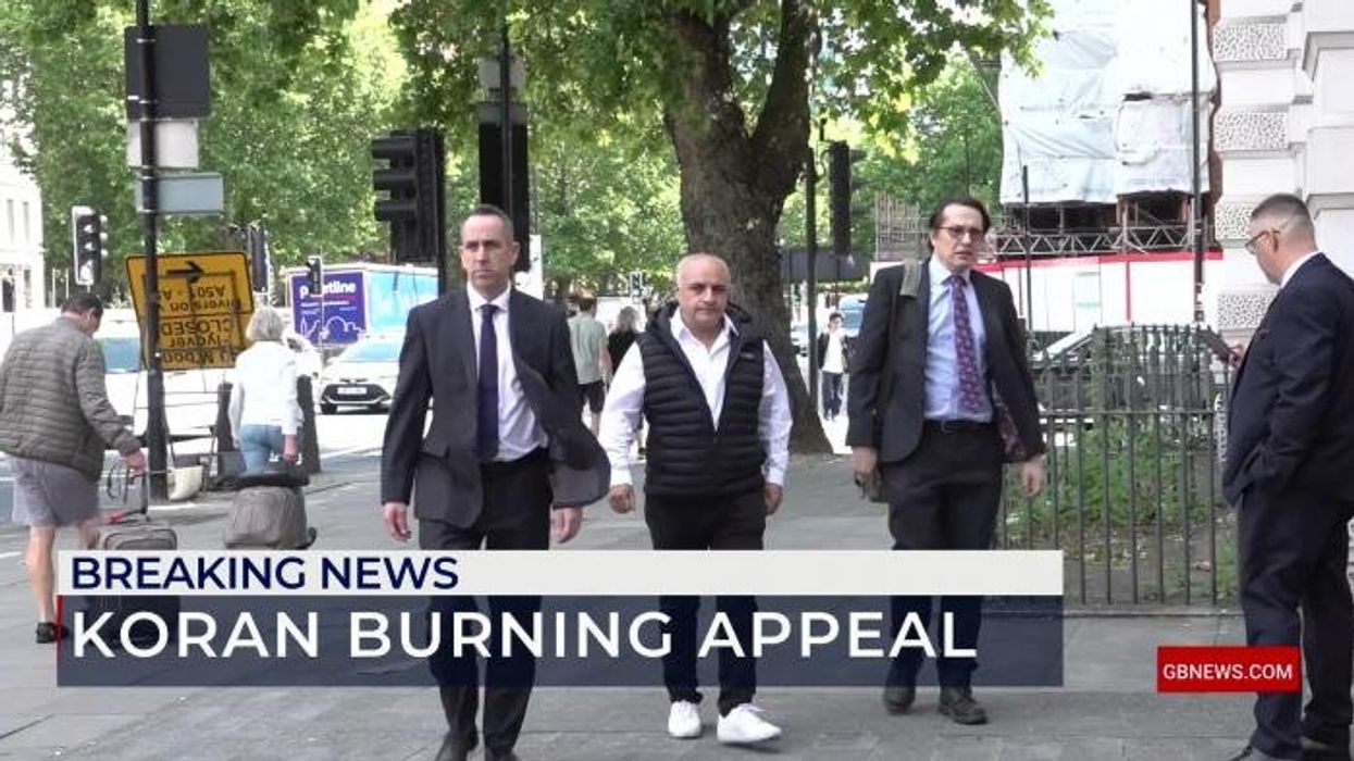 Man found guilty after burning Koran outside Turkish embassy wins appeal as campaigners hail 'victory for free speech'