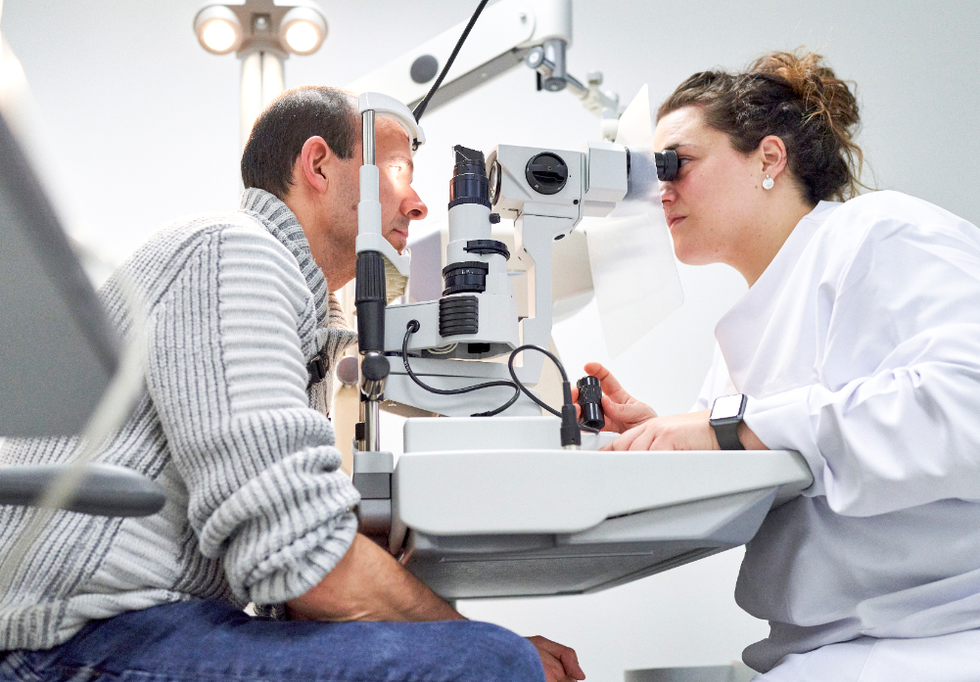 Man getting his eyes tested at the opticians