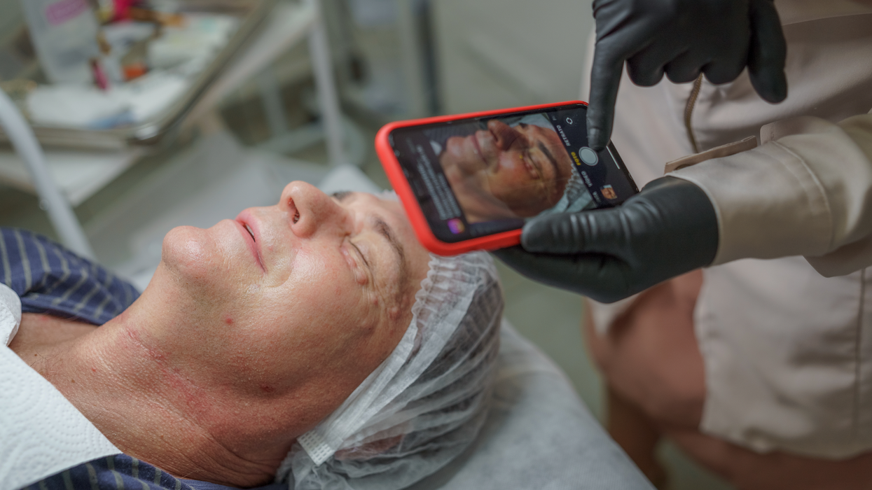 Man getting his face examined