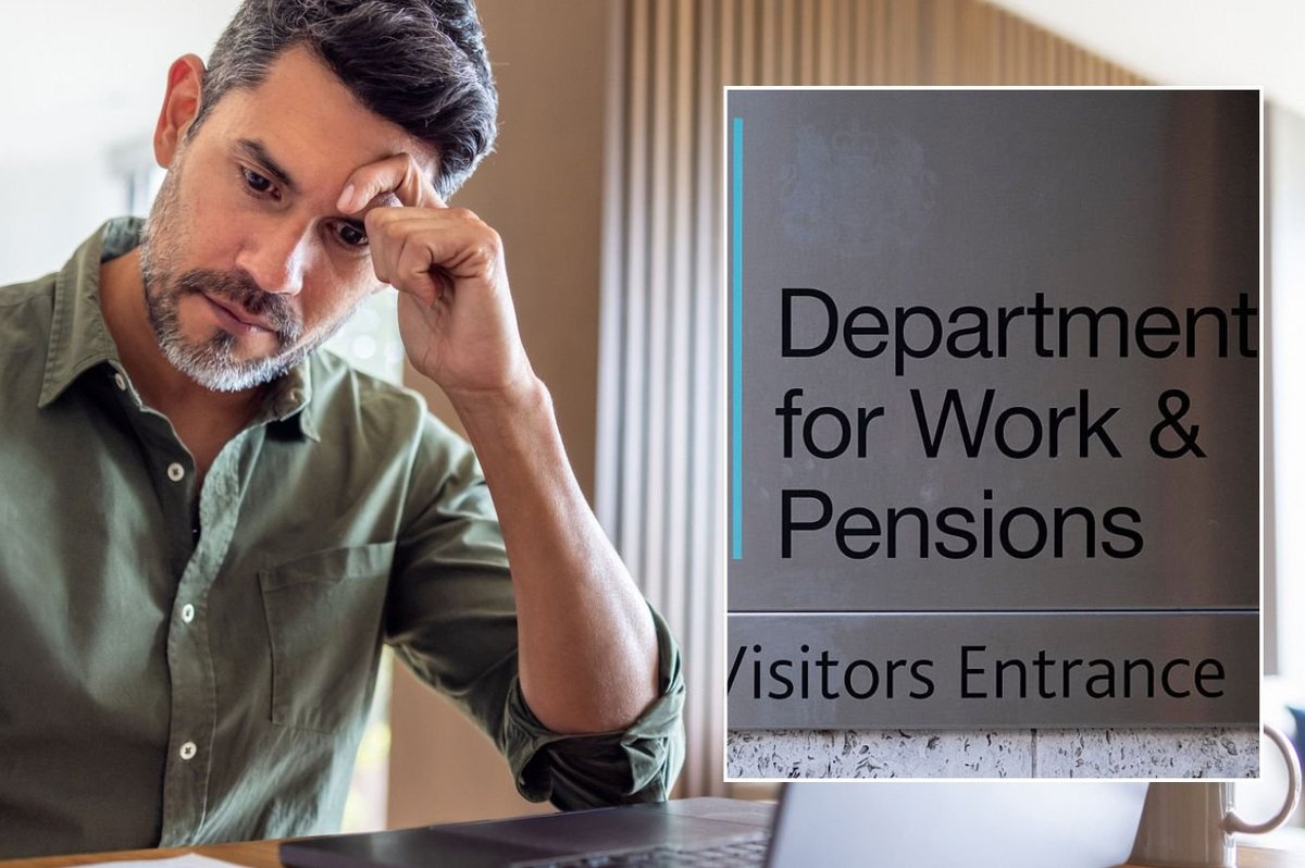 Man going over finances and DWP sign