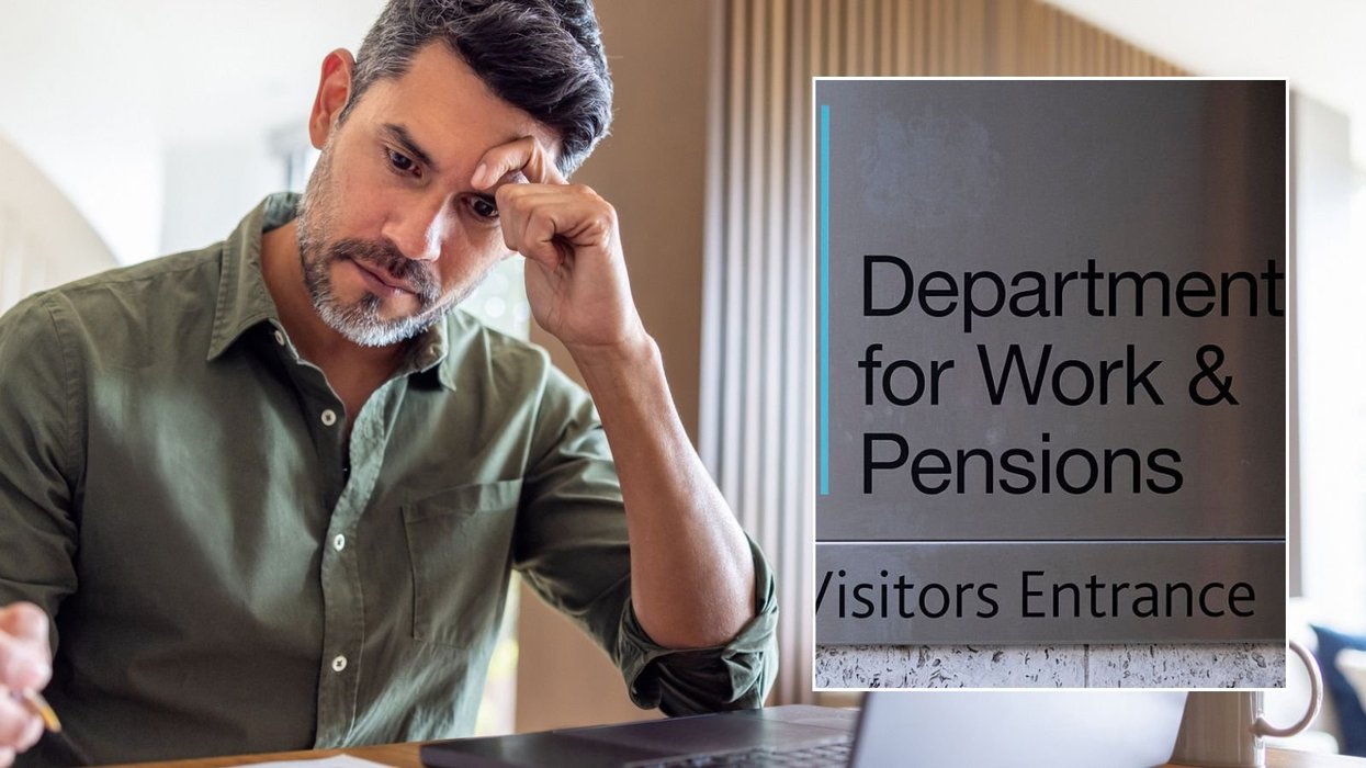 Man going over finances and DWP sign