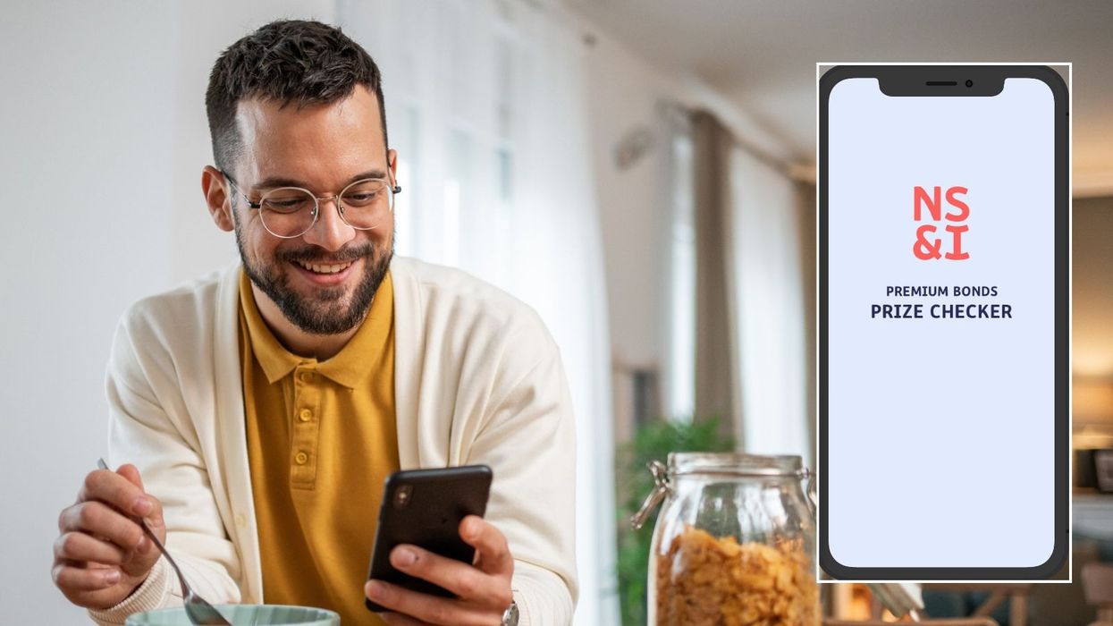 Man happy and NS&I prize checker