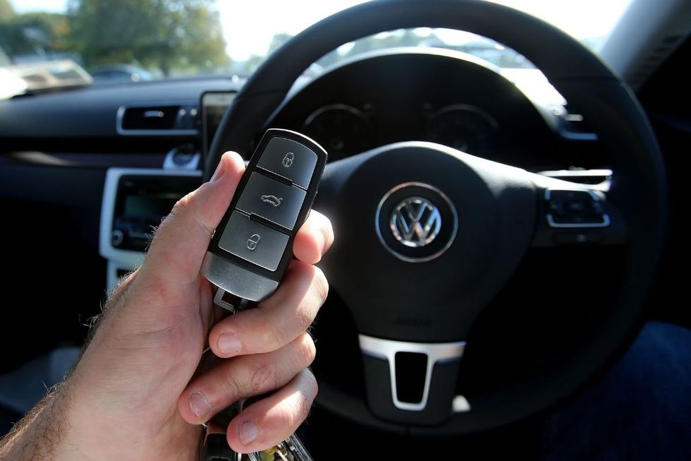 Man holding a car fob