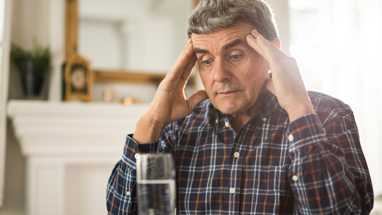Man holding his head