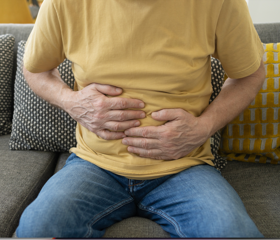 Man holding his stomach