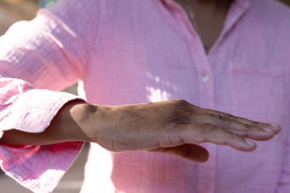 Man holding out hand