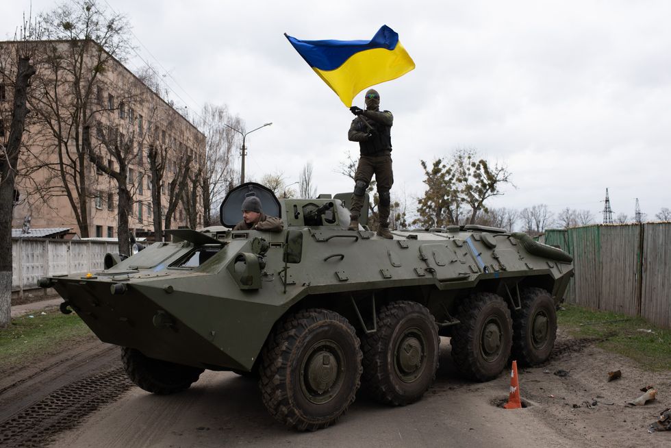 Man holds a Ukraine flag