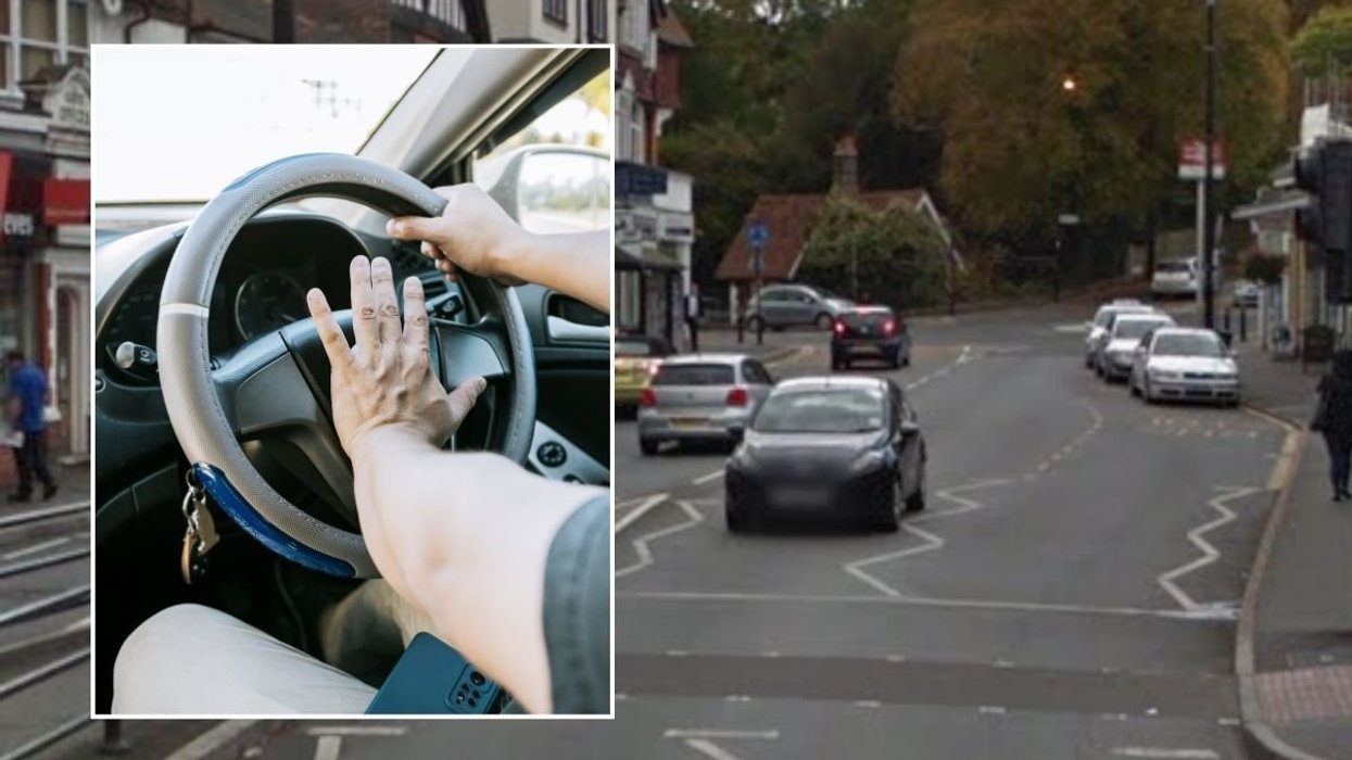 Man honking a car horn and Caterham Valley town centre