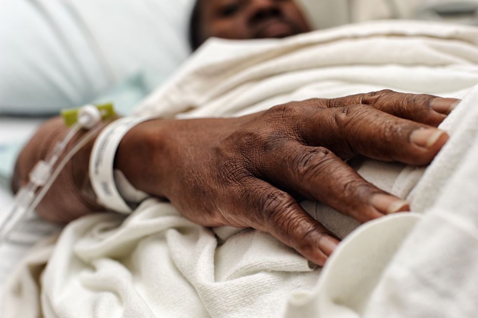 Man in hospital bed