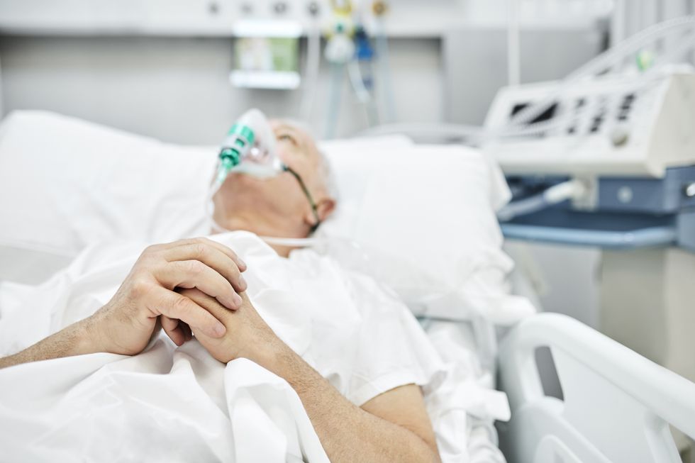 Man in hospital bed