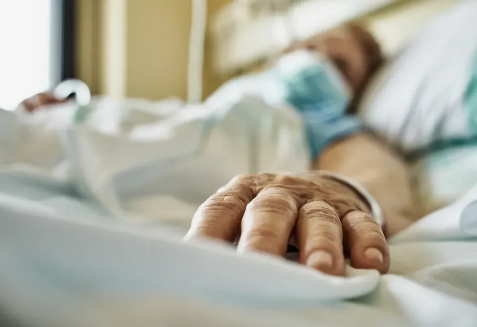 Man in hospital bed