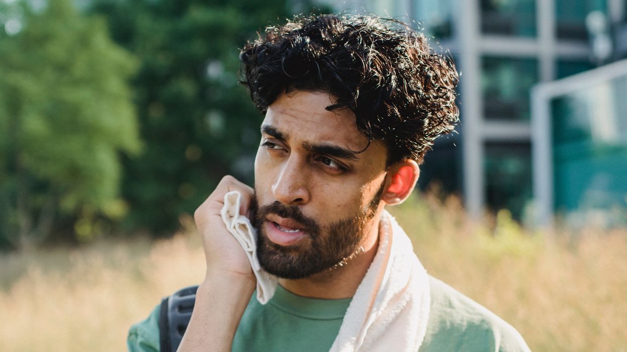 Man in the sun sweating